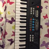 Tastiera elettronica giocattolo con microfono