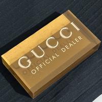 Gucci official dealer plexiglas