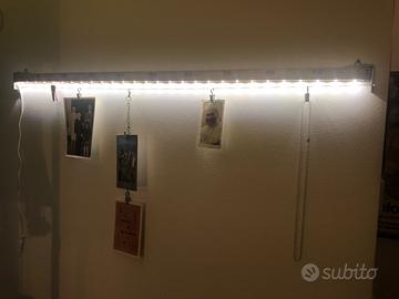 Metro in legno porta foto.