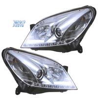 FARI OPEL ASTRA H 04-09 LUCE DIURNA LED FONDO CROM