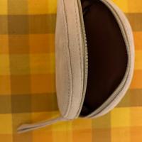 Pochette Guerlain beige dorata