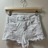 Pantaloncini denim elasticizzati con strappi