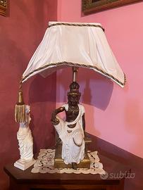 Lampada con scultura