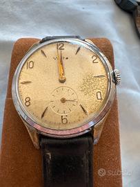 Orologio meccanico vetta anni 60