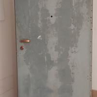 Porta in ferro da cantiere con telaio e controtela