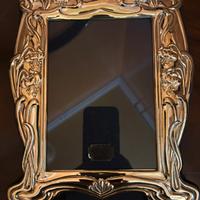 Cornice in argento