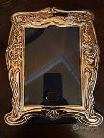 Cornice in argento
