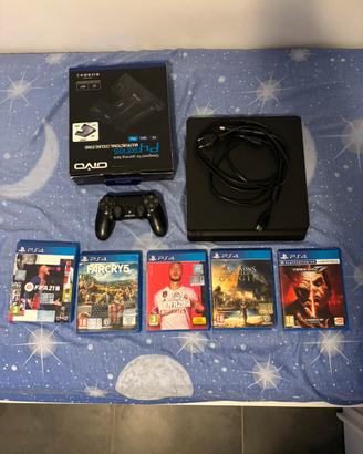 Ps4 + 2 joystick + base di ricarica + 5 giochi