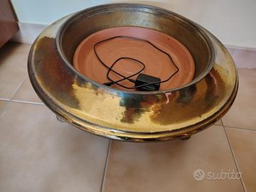 brace da riscaldamento antica