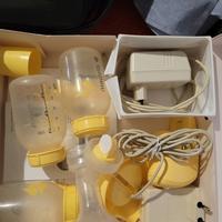 tiralatte medela + 3 contenitori e 2 trasformatori