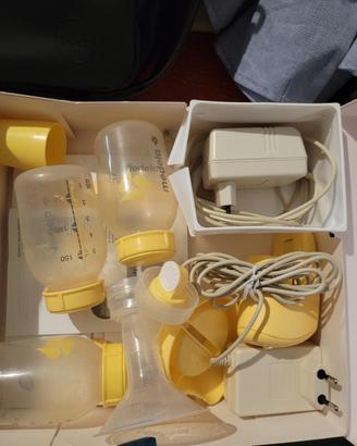 tiralatte medela + 3 contenitori e 2 trasformatori