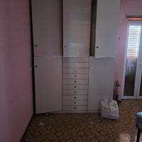armadio camera ragazzi con libreria