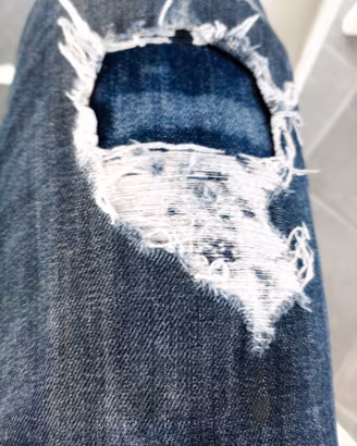 pantaloni jeans usati