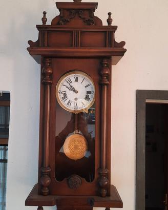 Orologio a pendolo da parete