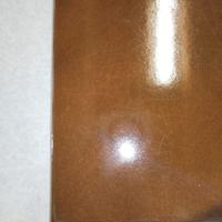 piastrelle marroni 20 x 20 cm.