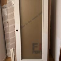 Porta scorrevole con vetro