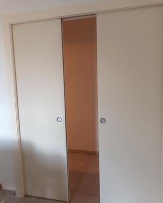 porta scorrevole a scrigno