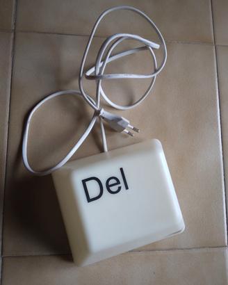 luce ambiente tasto "DEL"