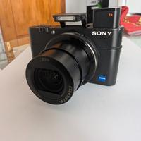 Fotocamera Sony DS-CRX100M3 + Custodia in Pelle Or