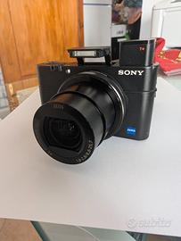 Fotocamera Sony DS-CRX100M3 + Custodia in Pelle Or