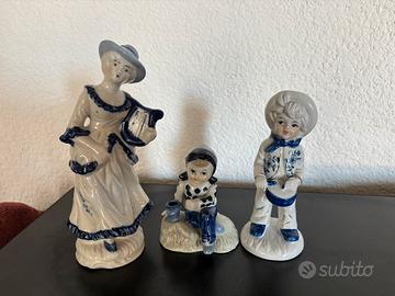 Statuine bianche blu oro