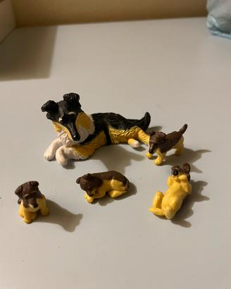 Set di statuette di plastica famiglia di cani
