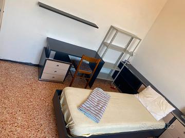 Un posto letto in una stanza doppia