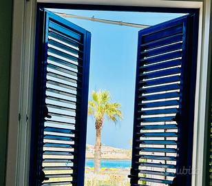 Estate fronte spiaggia a Lampedusa