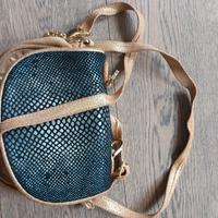 Pochette oro pitonata