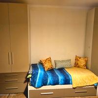 Cameretta  completa con armadi e letto contenitore