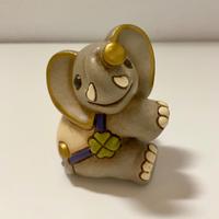 Elefante THUN con quadrifoglio in ceramica
