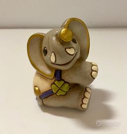 Elefante THUN con quadrifoglio in ceramica