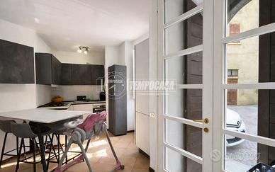 TRILOCALE SUL LUNGOFIUME CON POSTO AUTO