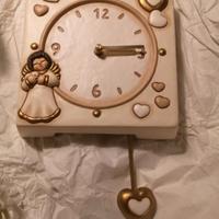 orologio a parete thun con angioletto 