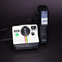 Polaroid Land Camera 1000 con flash