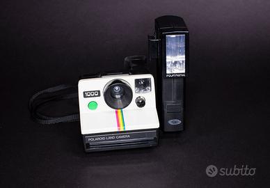 Polaroid Land Camera 1000 con flash
