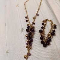 parure colore viola e dorata