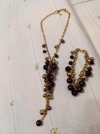 parure colore viola e dorata