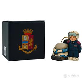 Addoppo poliziotto in motoslitta