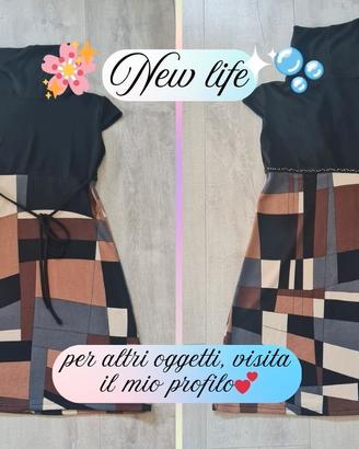 Vestito fantasia geometrica collo alto