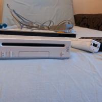 Wii + 2 telecomandi Wii.