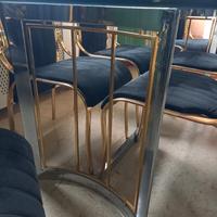 tavolo in cristallo e sei sedie 