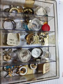 scatola componenti orologio bilancieri ricambi 