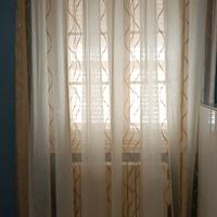 Tenda sartoriale e bracciolo a treccia