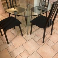 Tavolo rotondo in cristallo FIAM con 4 sedie