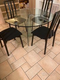 Tavolo rotondo in cristallo FIAM con 4 sedie