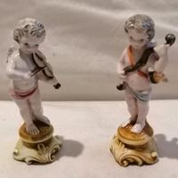 ceramica Bassano 2 putti alti 12 cm. 