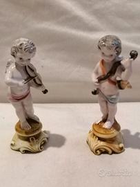 ceramica Bassano 2 putti alti 12 cm. 