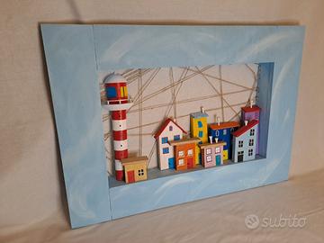 Borgo di mare con casette colorate e faro