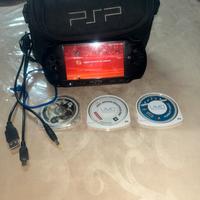 Psp e1004 con custodia filo 3giochi+13scaricati